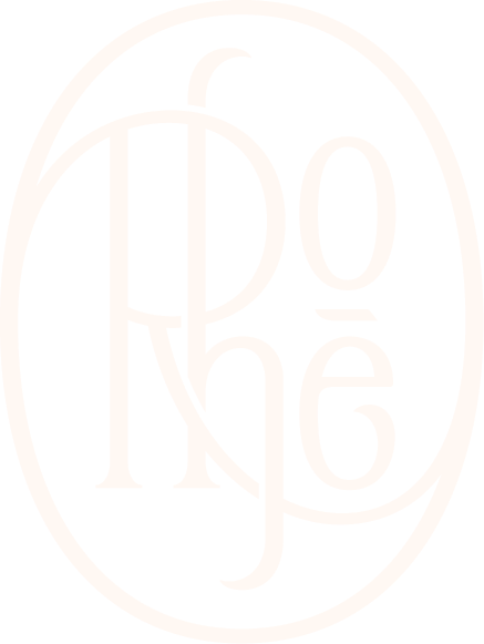 Cream-coloured art deco monogram logo with interlaced letters inside an oval emblem on dark background